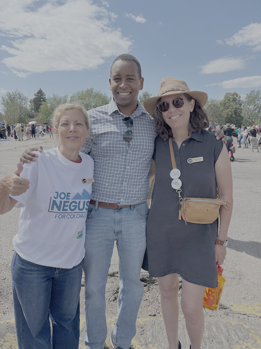 Tara at the Juneteenth Parade in Denver with Joe Neguse and Council Member Tina Marquis